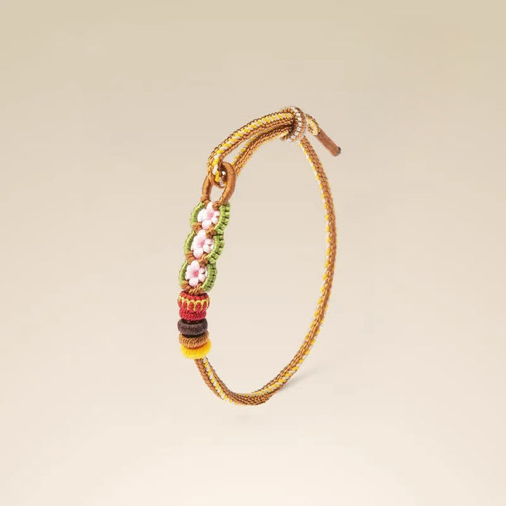 Buddha Stones Bracelet porte-bonheur à cordon ajustable, tissé à la main avec un motif floral chinois et un nœud décoratif. - image 3