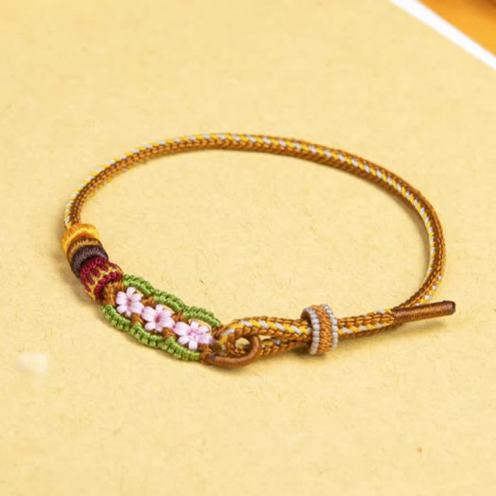 Buddha Stones Bracelet porte-bonheur à cordon ajustable, tissé à la main avec un motif floral chinois et un nœud décoratif. - image 2