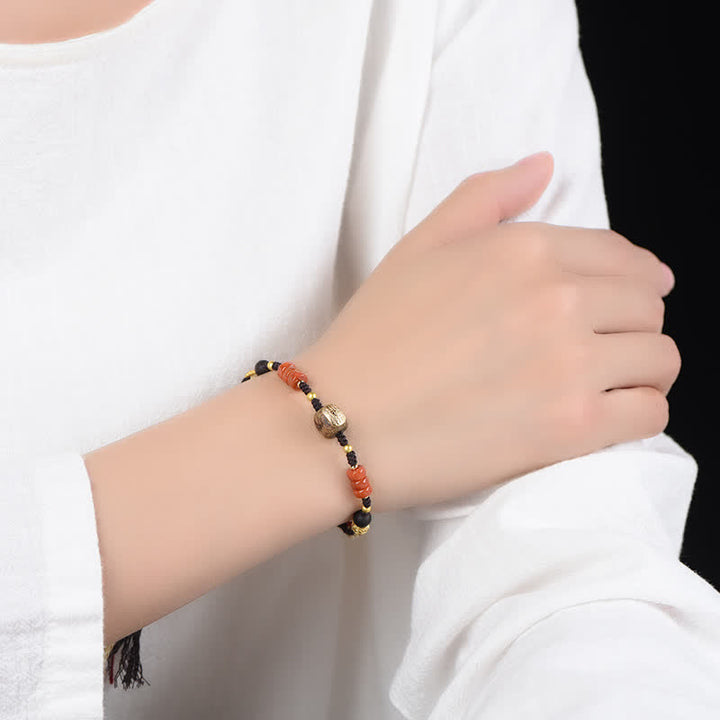 Buddha Stones Bracelet à pompon tressé en bois de santal rouge tissé à la main - image 11