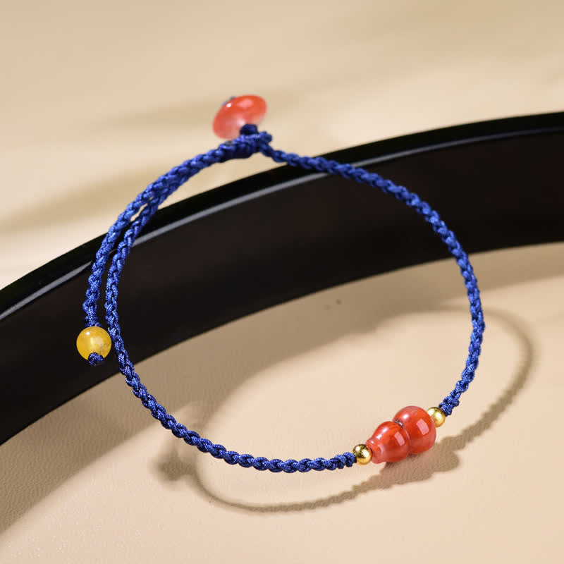 Buddha Stones Bracelet en calebasse d'agate rouge du Sud, tissé à la main avec un cordon bleu positif - image 1