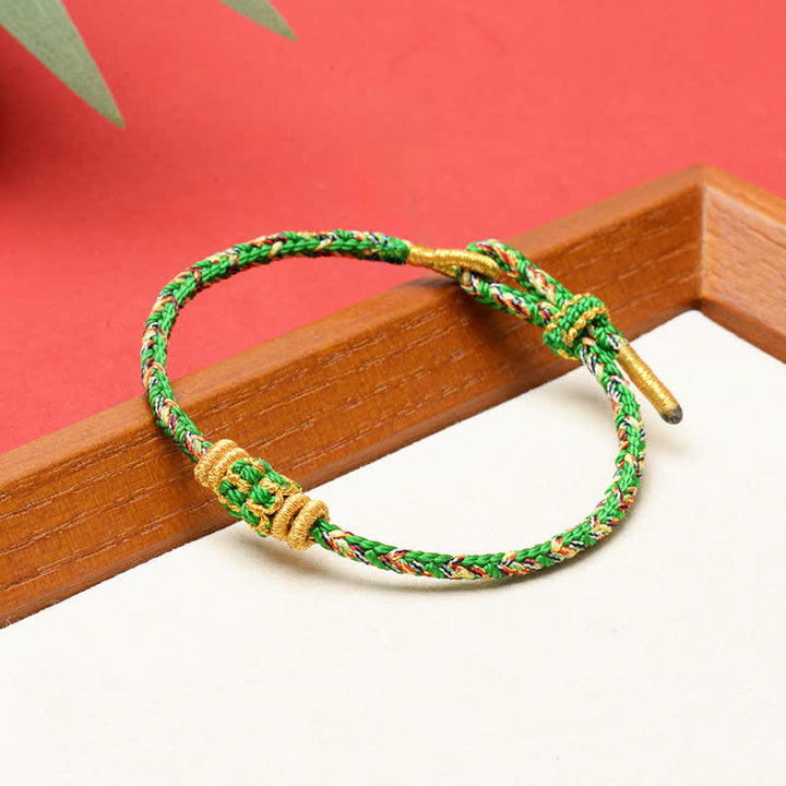 Buddha Stones Bracelet ajustable de protection composé de cinq couleurs de cordelette verte tissée à la main, de lingots verts et d'amulettes en forme de fleur de prunier. - Vert - Aucun accessoire - image 8