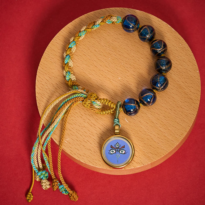 Buddha Stones Bracelet en perles de verre Liuli tibétain, orné des cinq directions, des dieux de la richesse et de la bénédiction du Bouddha. - Jambhala bleue (tour de poignet 15-24 cm) - image 0