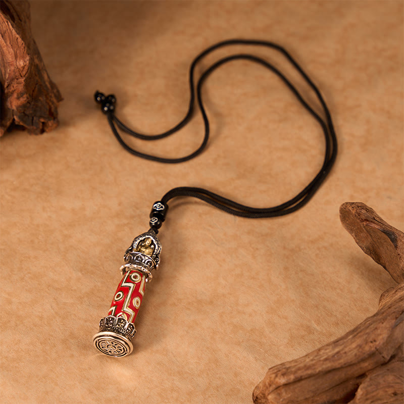 Buddha Stones Collier pendentif tibétain en cuivre à neuf yeux, orné d'un motif de perles Dzi, symbole de protection. - image 3