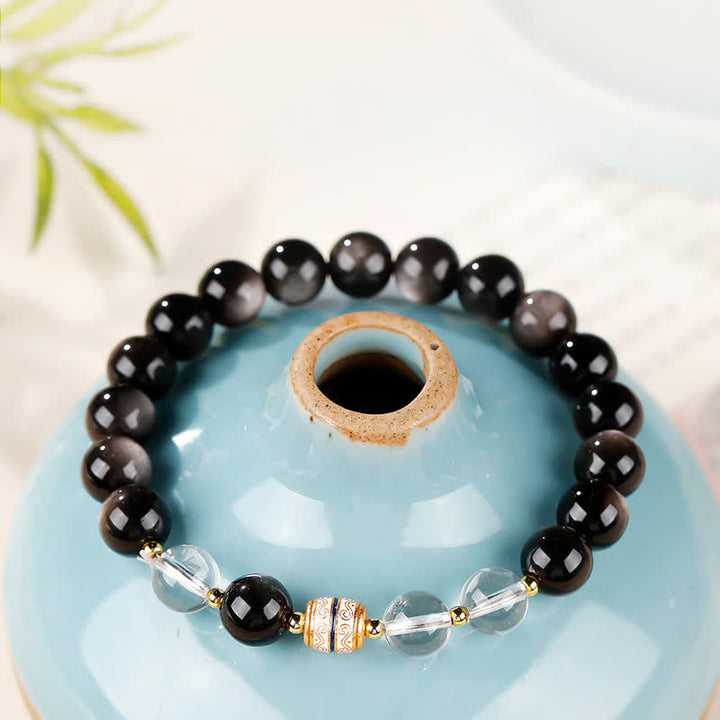 Buddha Stones Bracelet rond de protection en perles Dzi d'obsidienne argentée - Obsidienne à reflets argentés (Protection ♥ Apaisement) - 8 mm (Tour de poignet 16–17 cm) - image 0