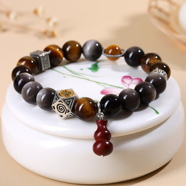 Buddha Stones Bracelet en calebasse orné du symbole Fu, en obsidienne argentée et à reflets argentés, symbole d'ancrage. - image 3