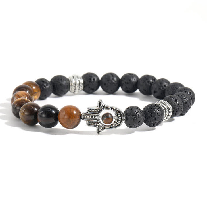 Buddha Stones Bracelet rond artisanal en pierre de lave et paume de Hamsa - Œil de tigre et roche de lave - image 11
