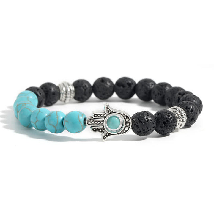 Buddha Stones Bracelet rond artisanal en pierre de lave et paume de Hamsa - image 10