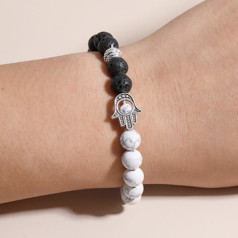 Buddha Stones Bracelet rond artisanal en pierre de lave et paume de Hamsa - image 17
