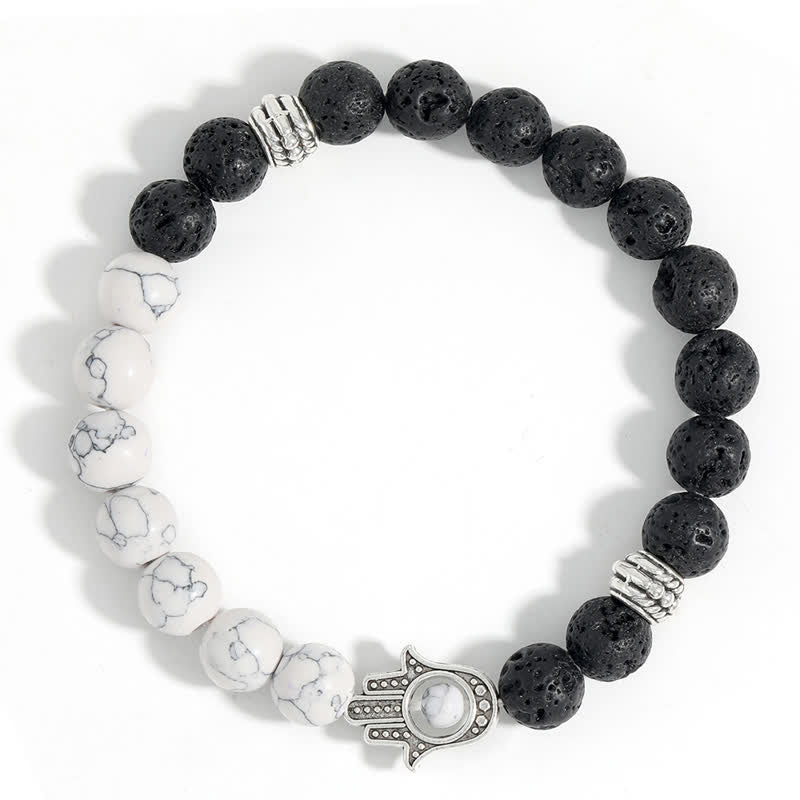 Buddha Stones Bracelet rond artisanal en pierre de lave et paume de Hamsa - image 14