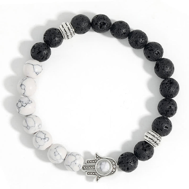 Buddha Stones Bracelet rond artisanal en pierre de lave et paume de Hamsa - image 14