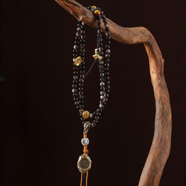Buddha Stones Collier de perles tissées à la main en obsidienne argentée avec Garuda protecteur - image 7