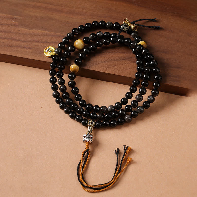 Buddha Stones Collier de perles tissées à la main en obsidienne argentée avec Garuda protecteur - image 0