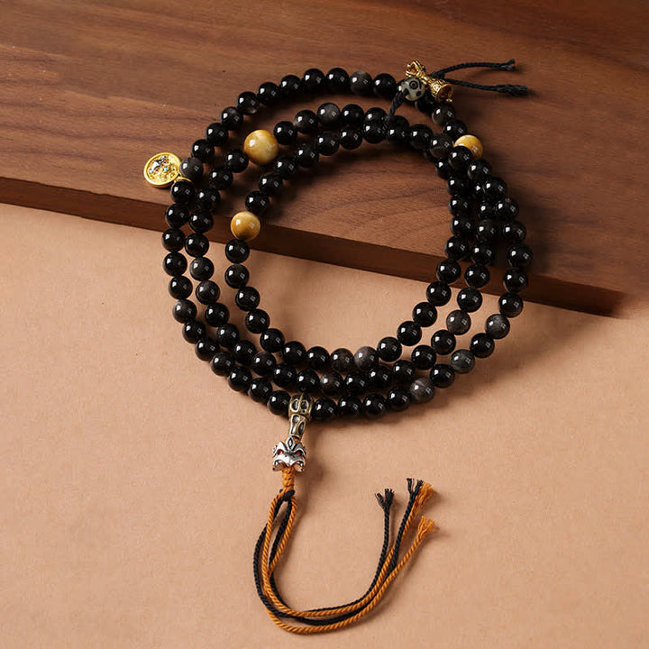 Buddha Stones Collier de perles tissées à la main en obsidienne argentée avec Garuda protecteur - image 0