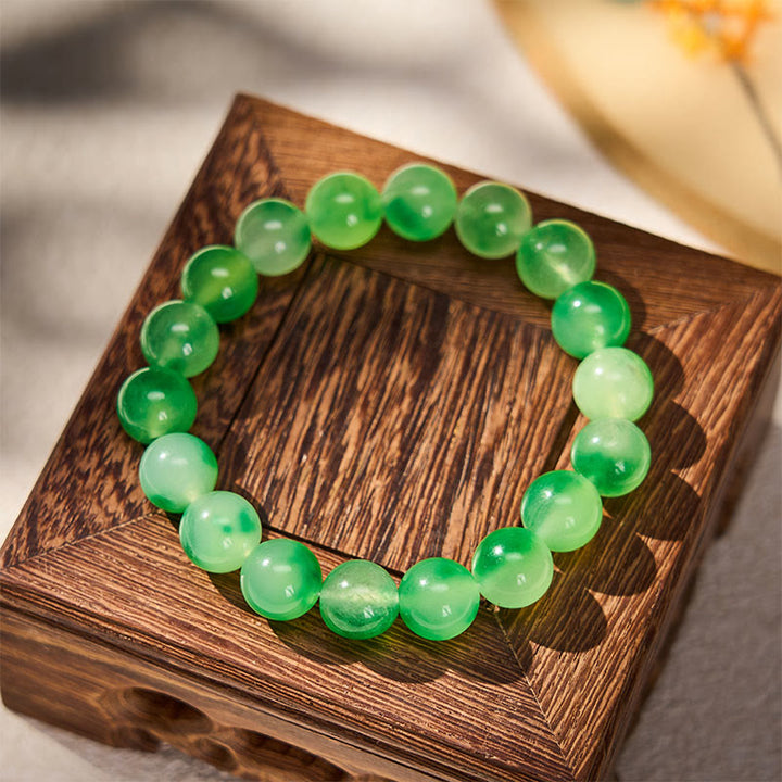 Buddha Stones Bracelet rond en calcédoine blanche, fleur verte flottante et perles de guérison - image 7
