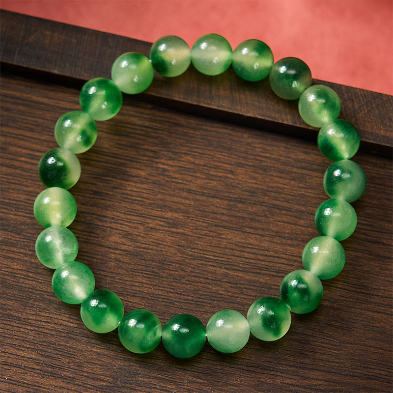 Buddha Stones Bracelet rond en calcédoine blanche, fleur verte flottante et perles de guérison - image 2
