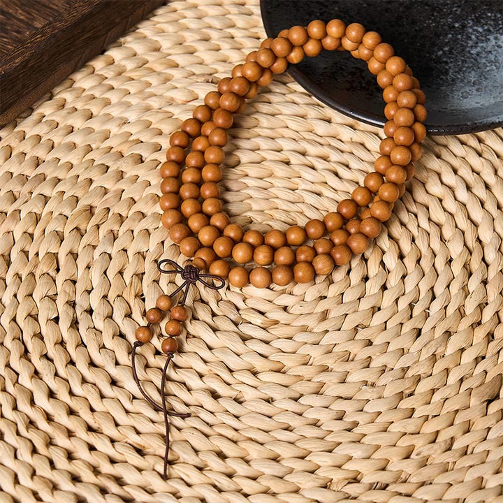 Buddha Stones Mala de perles rondes nouées, bénies par le bois de santal rouge, pour la méditation et la bénédiction. - 8 mm - Bois de santal rouge (Ancrage ♥ Méditation) - image 1
