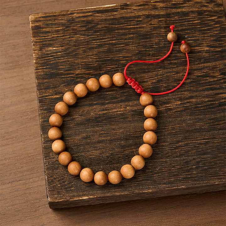 Buddha Stones Mala de poignet en bois de santal tibétain pour ancrer le corps - Bois de santal (Ancrage ♥ Méditation) - image 0