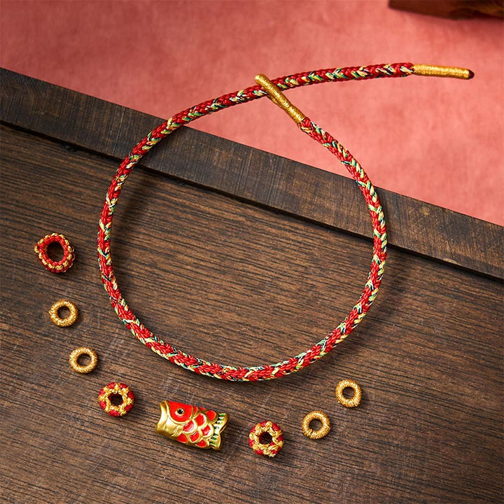 Buddha Stones Bracelet de protection en fil rouge tissé à la main, motif carpe koï et fleur - image 10
