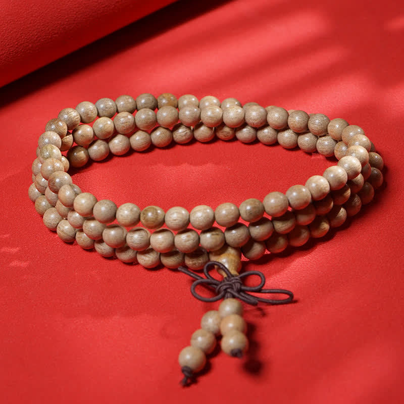 Buddha Stones Mala de 108 perles en bois de camphre naturel, symbole de persévérance - image 1