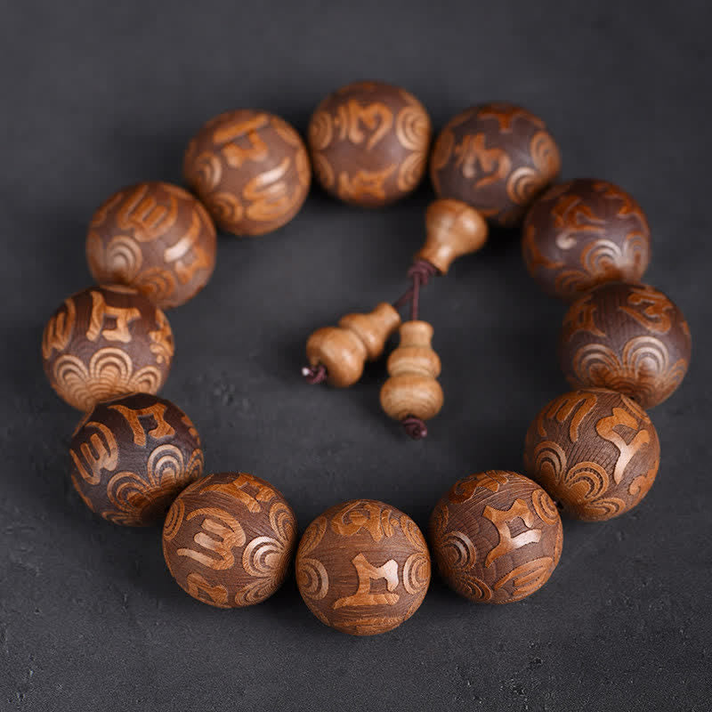 Buddha Stones Bracelet Sutra Om Mani Padme Hum en bois naturel d'Abelia Biflora Cœur de Bois. - Om Mani Padme Hum - image 0