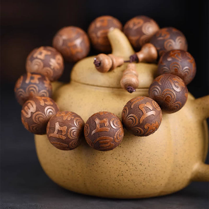 Buddha Stones Bracelet Sutra Om Mani Padme Hum en bois naturel d'Abelia Biflora Cœur de Bois. - image 1