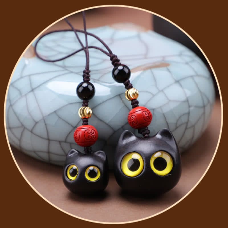 Buddha Stones Porte-clés en bois d'ébène sculptés à la main représentant un chat mignon symbolisant la paix et l'ancrage - image 18