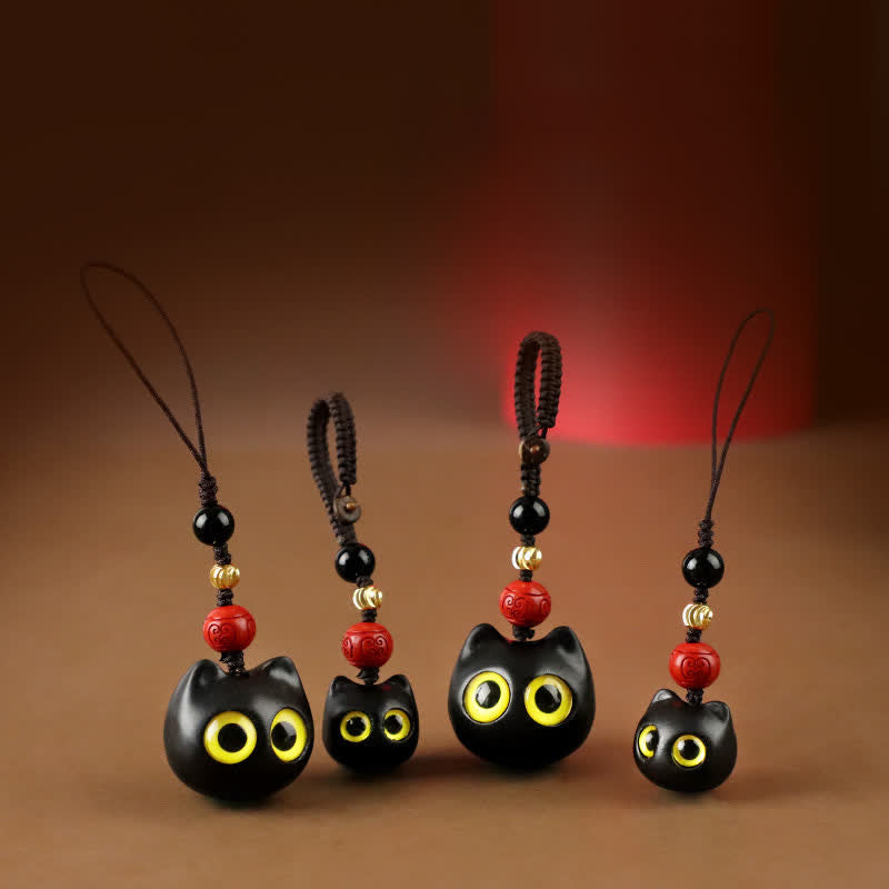 Buddha Stones Porte-clés en bois d'ébène sculptés à la main représentant un chat mignon symbolisant la paix et l'ancrage - image 19