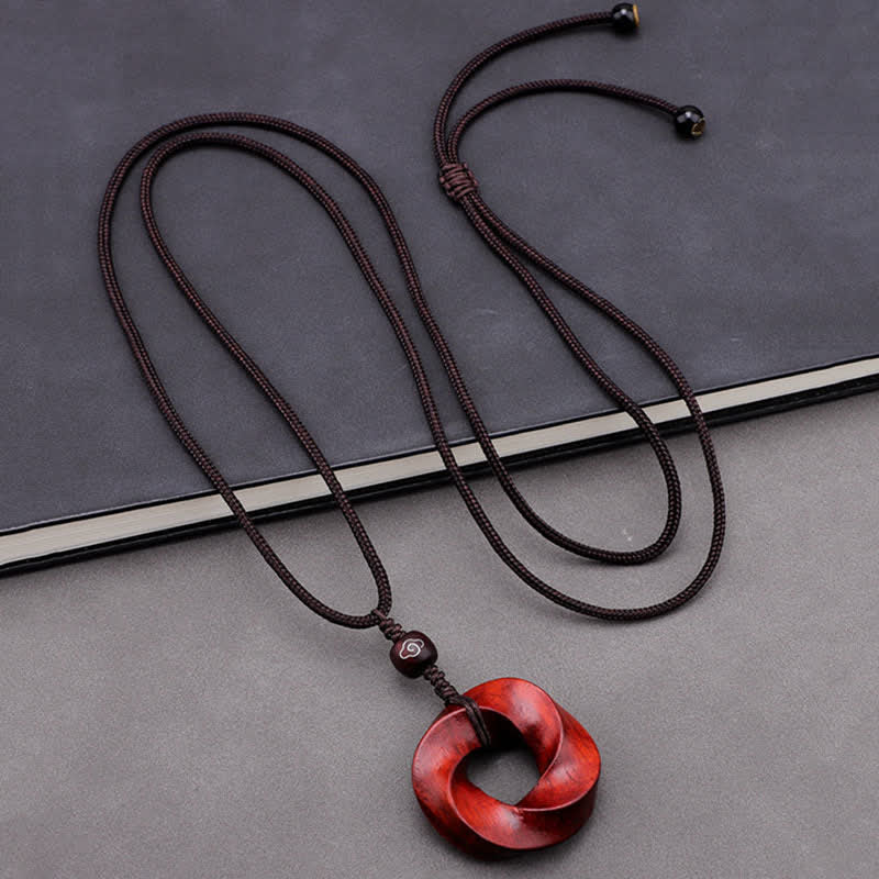 Buddha Stones Collier pendentif en corde d'éternité avec nœud infini en bois de santal rouge - image 1