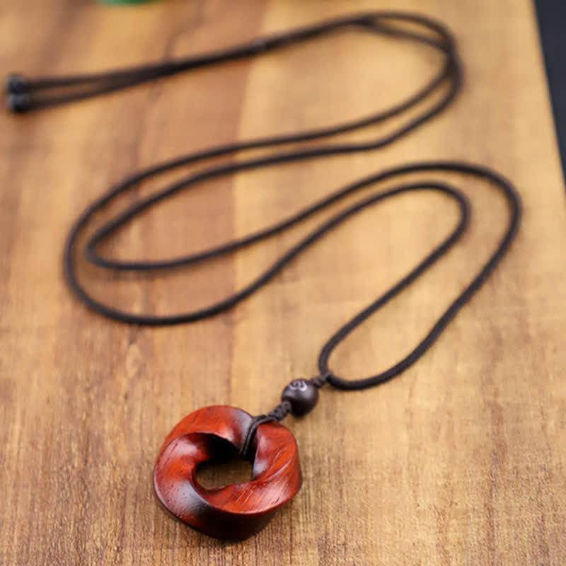 Buddha Stones Collier pendentif en corde d'éternité avec nœud infini en bois de santal rouge - image 8