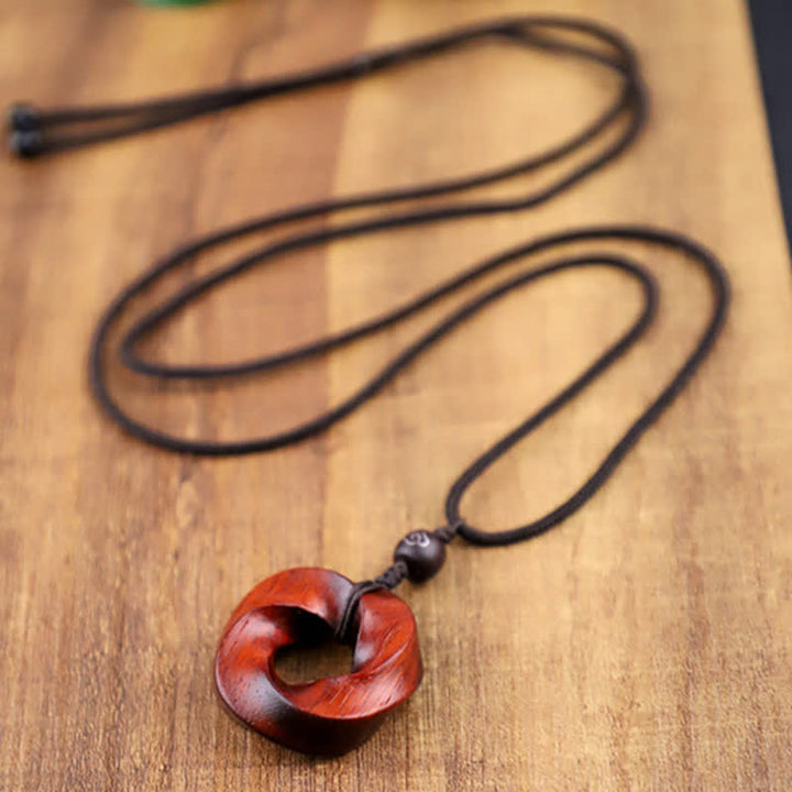 Buddha Stones Collier pendentif en corde d'éternité avec nœud infini en bois de santal rouge - image 8
