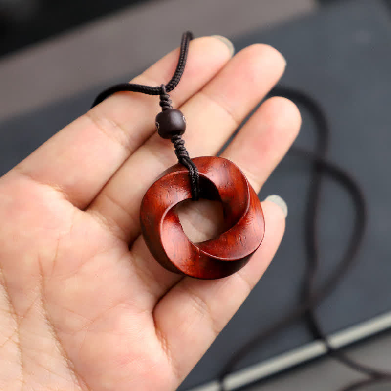 Buddha Stones Collier pendentif en corde d'éternité avec nœud infini en bois de santal rouge - image 10