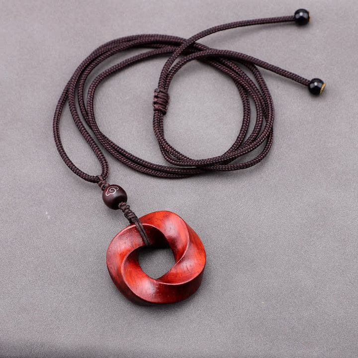 Buddha Stones Collier pendentif en corde d'éternité avec nœud infini en bois de santal rouge - image 6