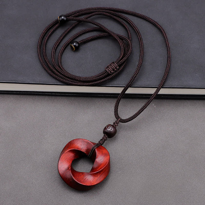 Buddha Stones Collier pendentif en corde d'éternité avec nœud infini en bois de santal rouge - image 4