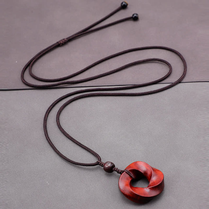 Buddha Stones Collier pendentif en corde d'éternité avec nœud infini en bois de santal rouge - image 7