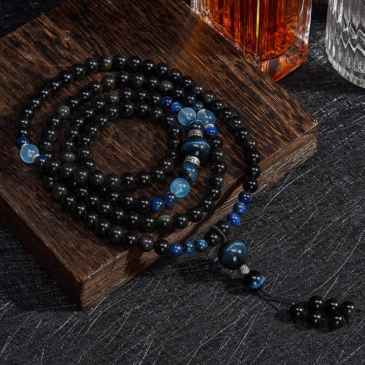 Mala de protection ronde en obsidienne noire de Buddha Stones, faite à la main, composée de 108 perles et ornée d'un pompon rond. - Obsidienne noire (Protection ♥ Ancrage) - image 0