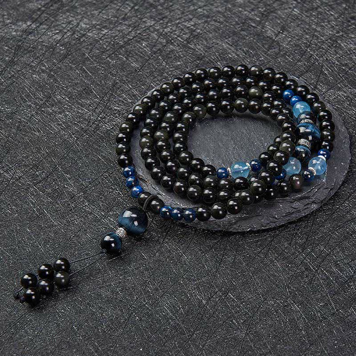Mala de protection ronde en obsidienne noire de Buddha Stones, faite à la main, composée de 108 perles et ornée d'un pompon rond. - image 3