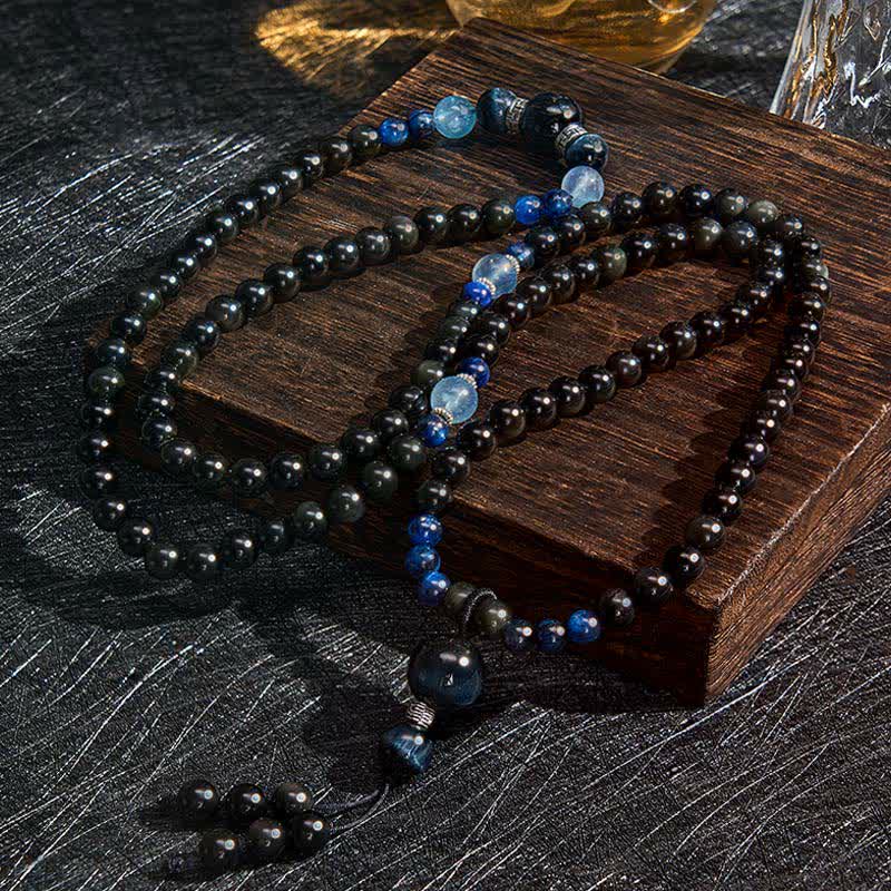 Mala de protection ronde en obsidienne noire de Buddha Stones, faite à la main, composée de 108 perles et ornée d'un pompon rond. - image 1