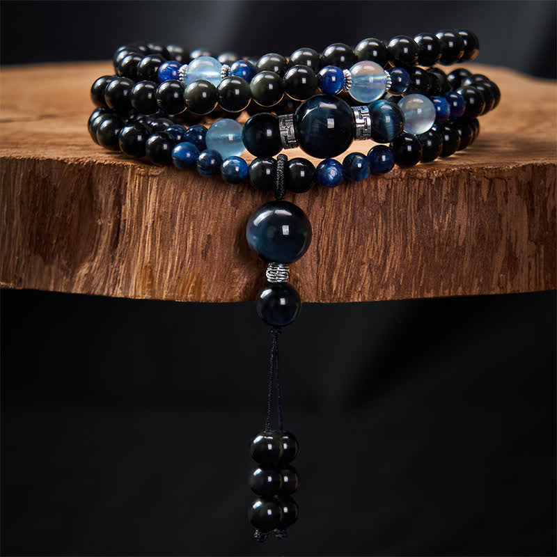 Mala de protection ronde en obsidienne noire de Buddha Stones, faite à la main, composée de 108 perles et ornée d'un pompon rond. - image 2