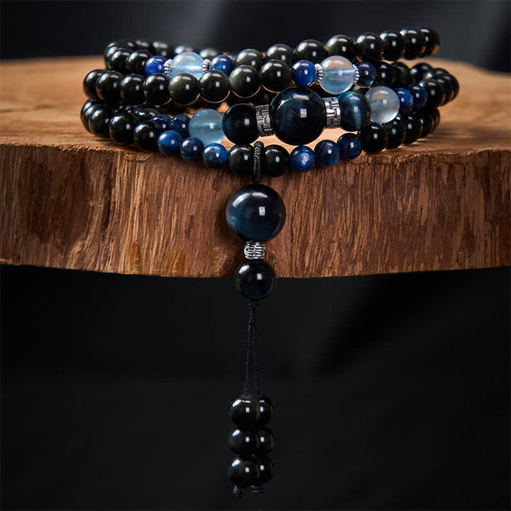 Mala de protection ronde en obsidienne noire de Buddha Stones, faite à la main, composée de 108 perles et ornée d'un pompon rond. - image 2