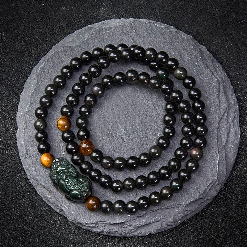 Buddha Stones Bracelet PiXiu en obsidienne arc-en-ciel et obsidienne noire, symbole de richesse, sculpté à la main. - Perle d'obsidienne arc-en-ciel (couleurs changeantes selon la lumière) - 6 mm - image 0