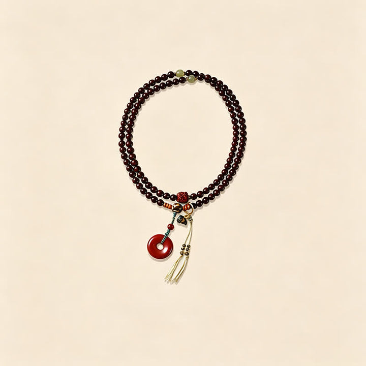 Buddha Stones Mala de protection tissée à la main en bois de santal rouge, avec boucle de paix et 108 perles - image 6