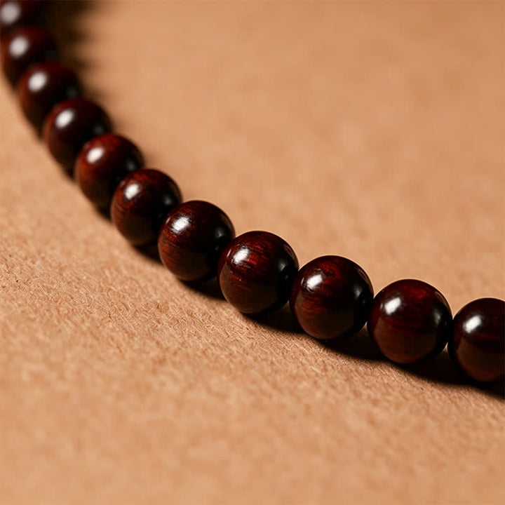 Buddha Stones Mala de protection tissée à la main en bois de santal rouge, avec boucle de paix et 108 perles - image 13