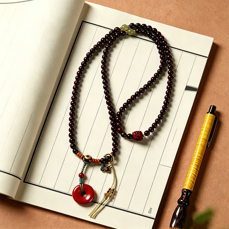 Buddha Stones Mala de protection tissée à la main en bois de santal rouge, avec boucle de paix et 108 perles - image 4
