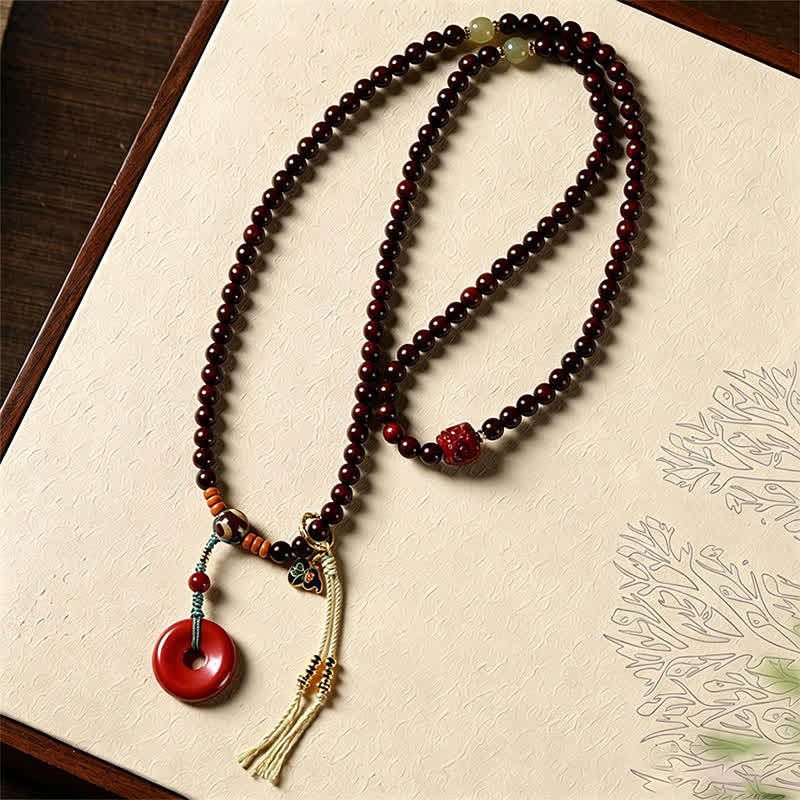 Buddha Stones Mala de protection tissée à la main en bois de santal rouge, avec boucle de paix et 108 perles - image 3