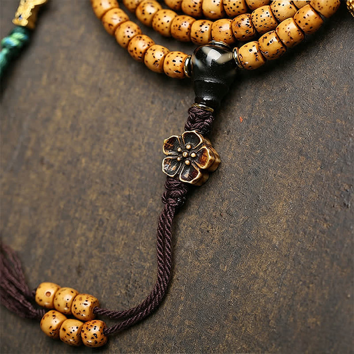 Buddha Stones Mala tibétain fait main de 108 perles, orné de graines de Bodhi, de courge renard et d'étoiles lunaires. - image 7