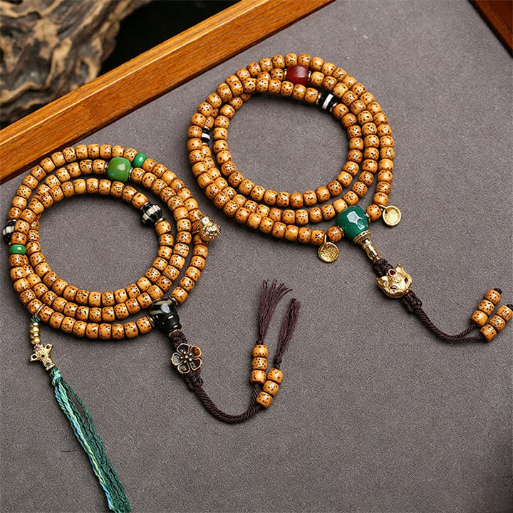 Buddha Stones Mala tibétain fait main de 108 perles, orné de graines de Bodhi, de courge renard et d'étoiles lunaires. - image 4