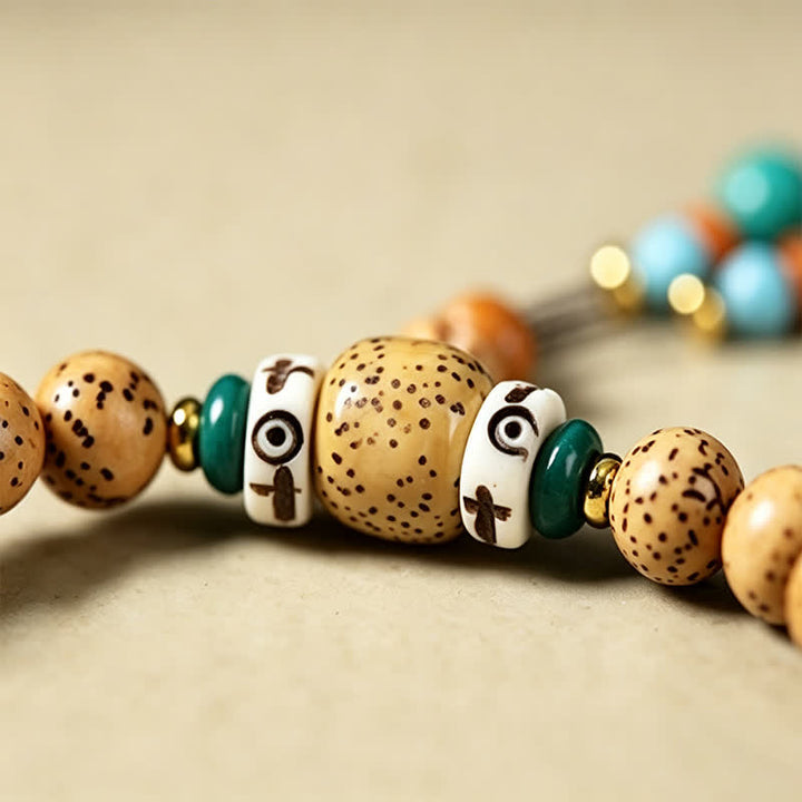 Buddha Stones Mala rond de 108 perles, orné de graines de lotus, de graines de Bodhi et d'étoiles, de lunes et de graines, fabriqué à la main. - image 15