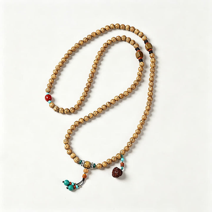 Buddha Stones Mala rond de 108 perles, orné de graines de lotus, de graines de Bodhi et d'étoiles, de lunes et de graines, fabriqué à la main. - image 3