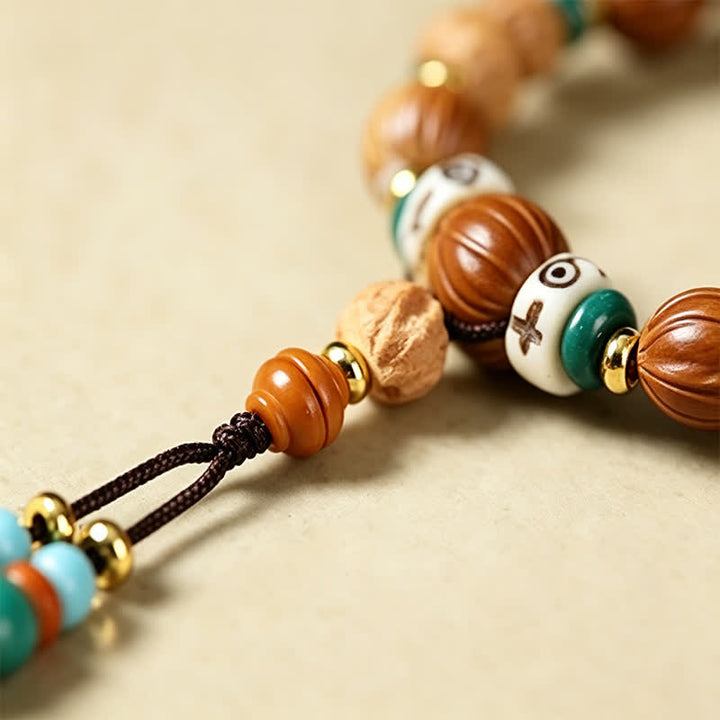 Buddha Stones Mala rond de 108 perles, orné de graines de lotus, de graines de Bodhi et d'étoiles, de lunes et de graines, fabriqué à la main. - image 16