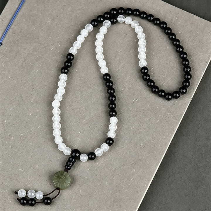 Buddha Stones Bracelet de protection Bagua en obsidienne noire, perlé à la main - image 1